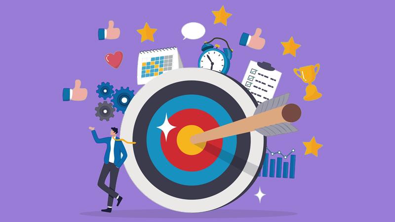 Illustration of a man leaning against a bullseye with other graphics like stars, graphs, a trophy, an alarm clock and thumbs up emojis surrounding it.
